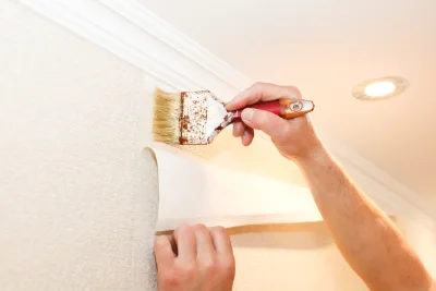 Pose de papier peint à l'Hôpital-d'Orion — revêtements muraux et toiles de verre